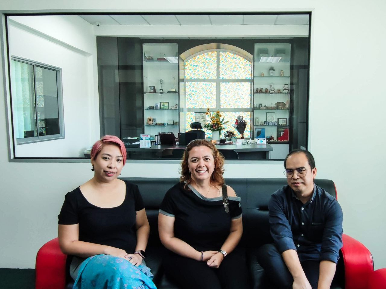Founders of SM Health Care Sdn Bhd, Helga Smith, Paulus Lagadan, and Amilia Alcantra, seated together.
