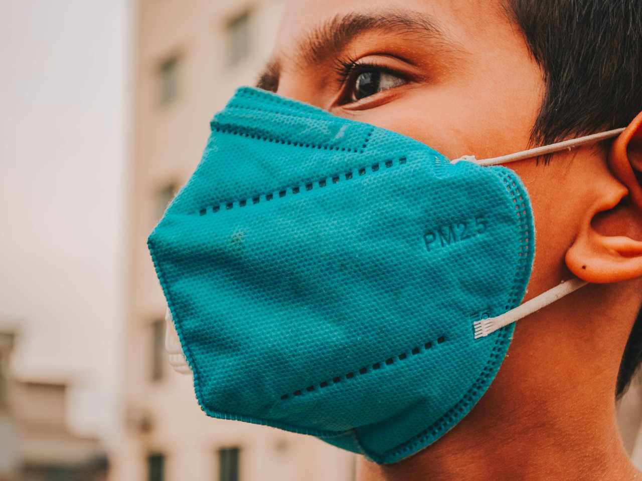 Boy wearing blue colour KN95 face mask