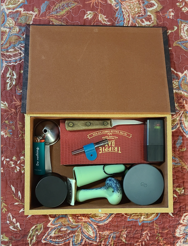Stash box with Glow Pipes, Grinder, Lighter, HauteBox, Cones, One Hitter