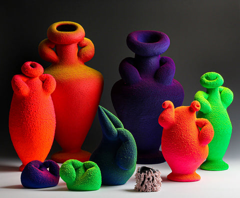 Maxwell Mustardo amorphous, textured vases in bright neon colors.