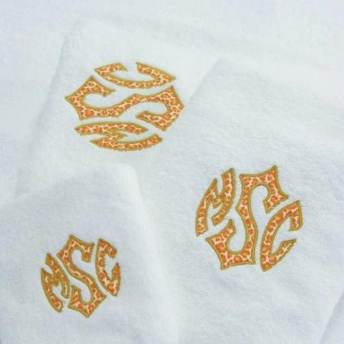 TOWEL in Monogram canvas, gilded brass trim Approx. 38.5…