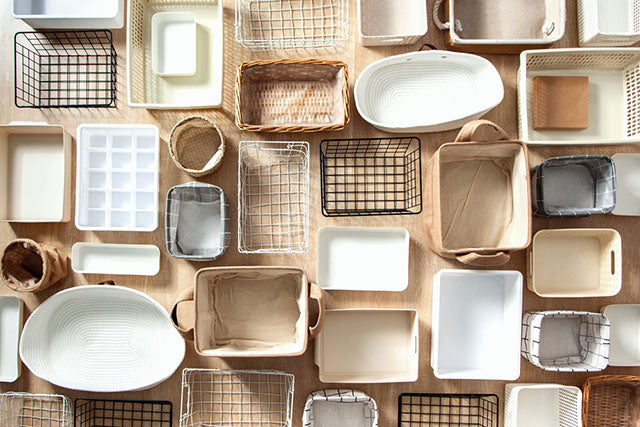 table with variety organizer bins