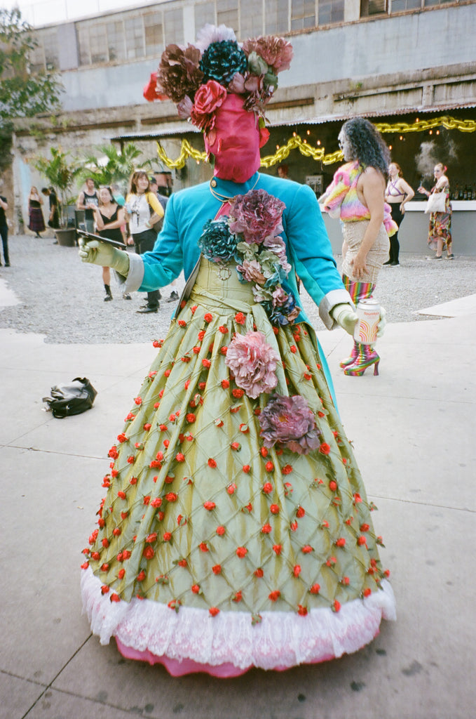 patron posing is gorgeous floral dress.