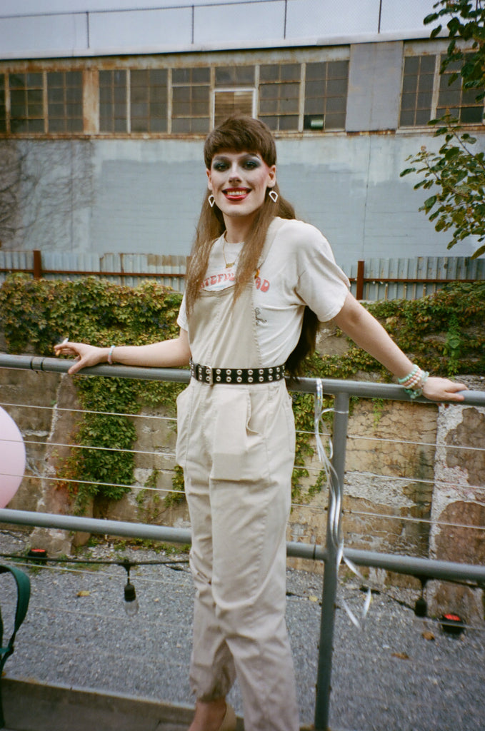 patron outside in a jumpsuit.