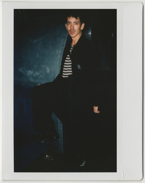 employee posing, full body shot - polaroid style.