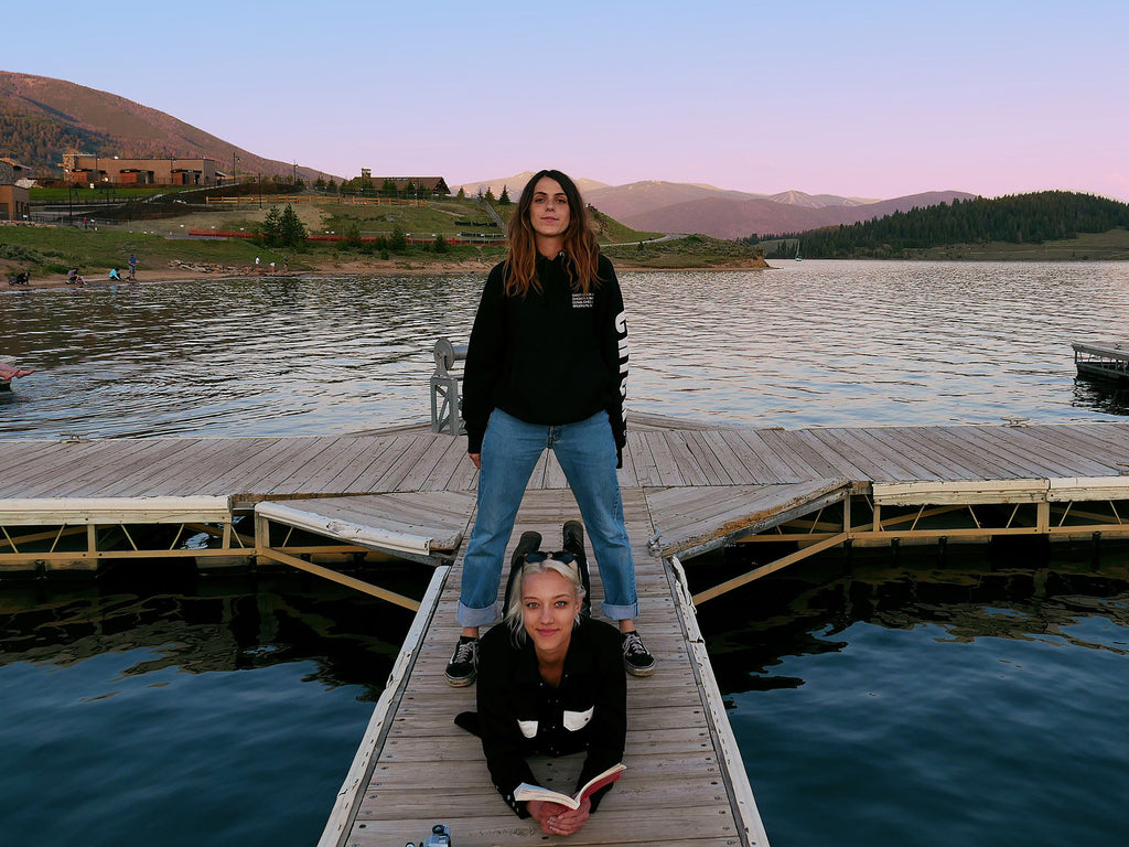 two people posing on the dock.