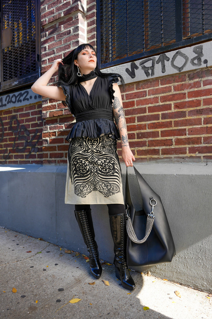 savanah harris in elegant conceptual black look.