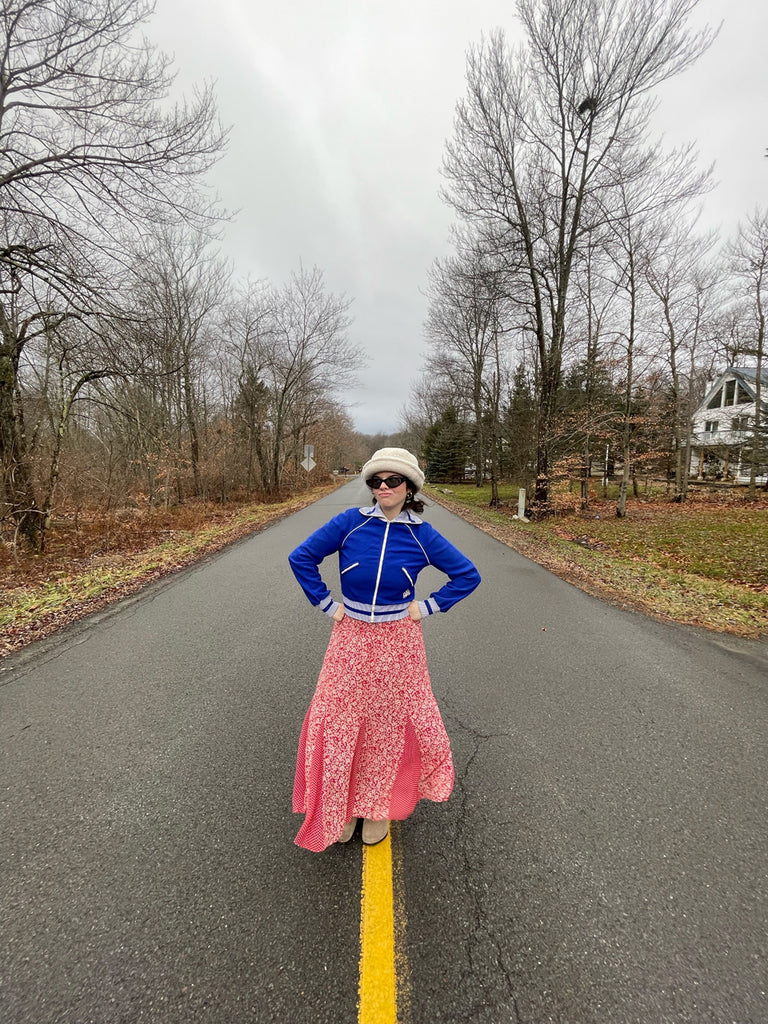 carol carlovich posing in the middle of the street 