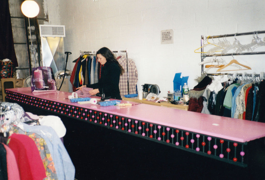 molly s. at the pink and black buying counter, bedford location