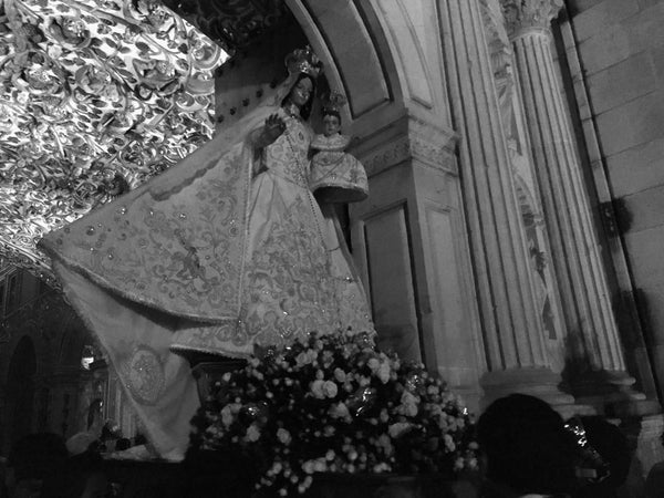 the parade of santa maria with image of a saint in the church.