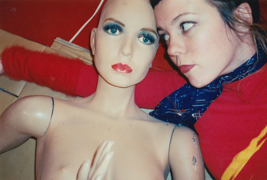 portrait of mannequin head and carrie.