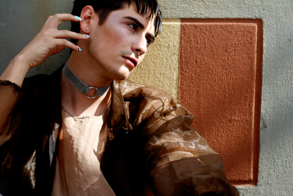 andrew modeling choker necklace.