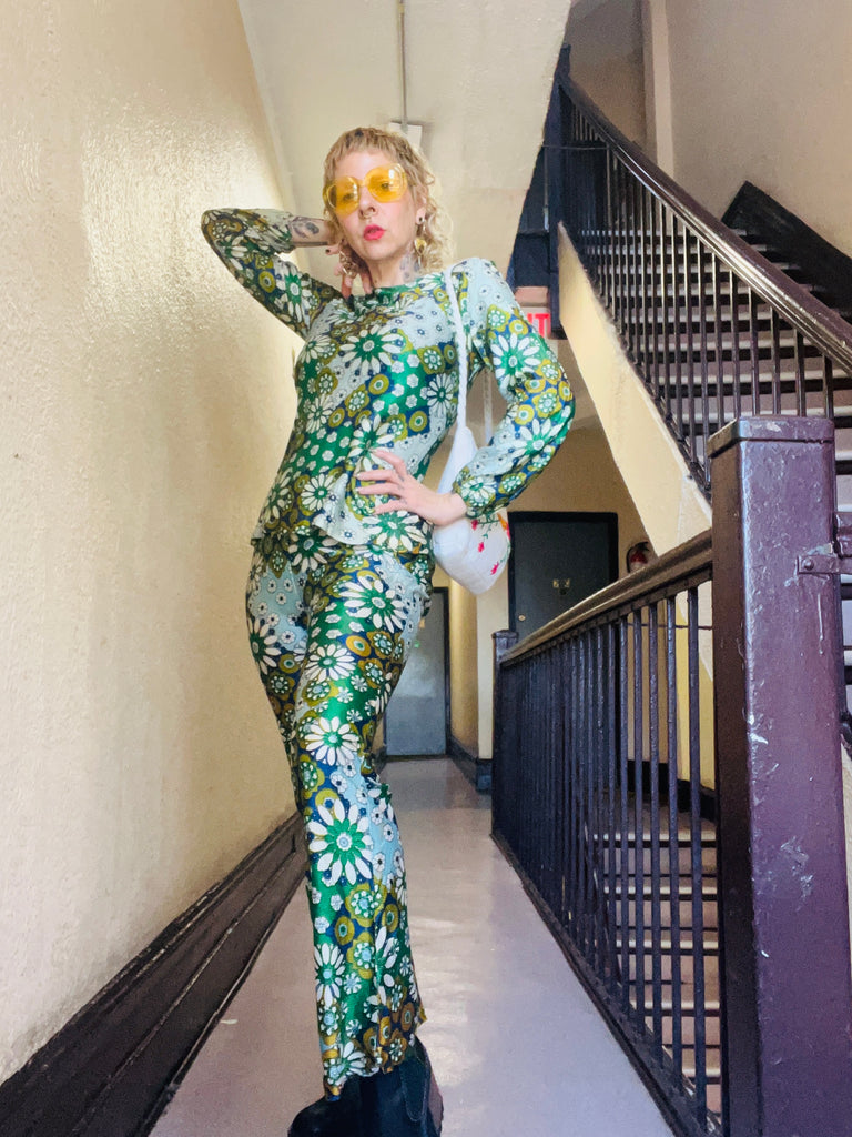 blaire ludwig posing in hallway in vintage two piece and bag