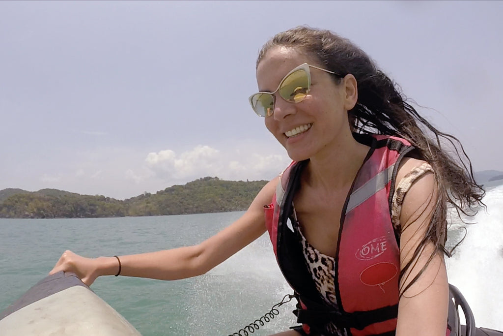 person smiling at gopro screen grab on the jet skiii. 