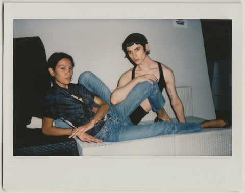 employees modeling to the camera - polaroid style.