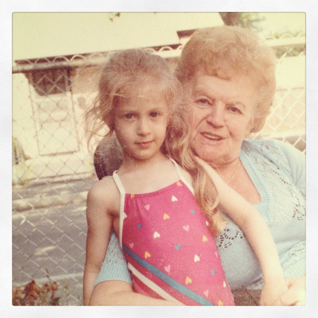 polaroid of nogah rotstein with their grandmother.