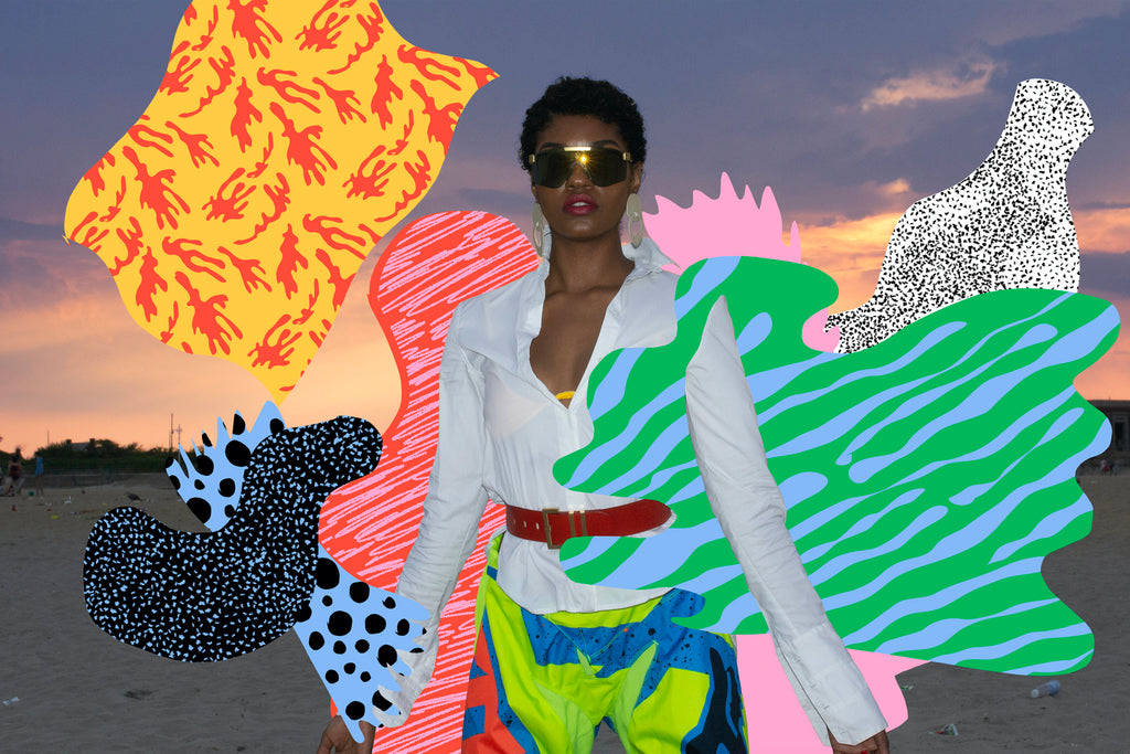 model in race pants and button up shirt at the beach with collage art added in post by dana.
