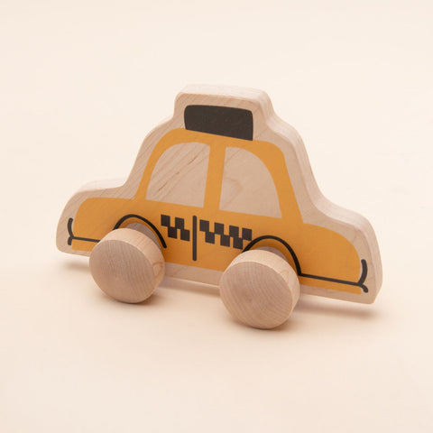 yellow taxi push toy