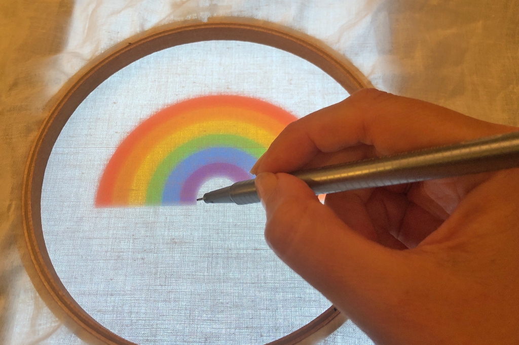 tracing rainbow in hoop for embroidery