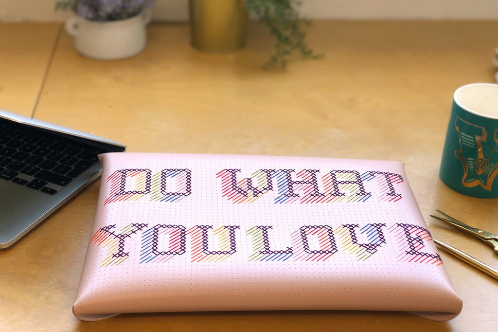 Stitch laptop sleeve in pink leather with do what you love stitched in rainbow threads