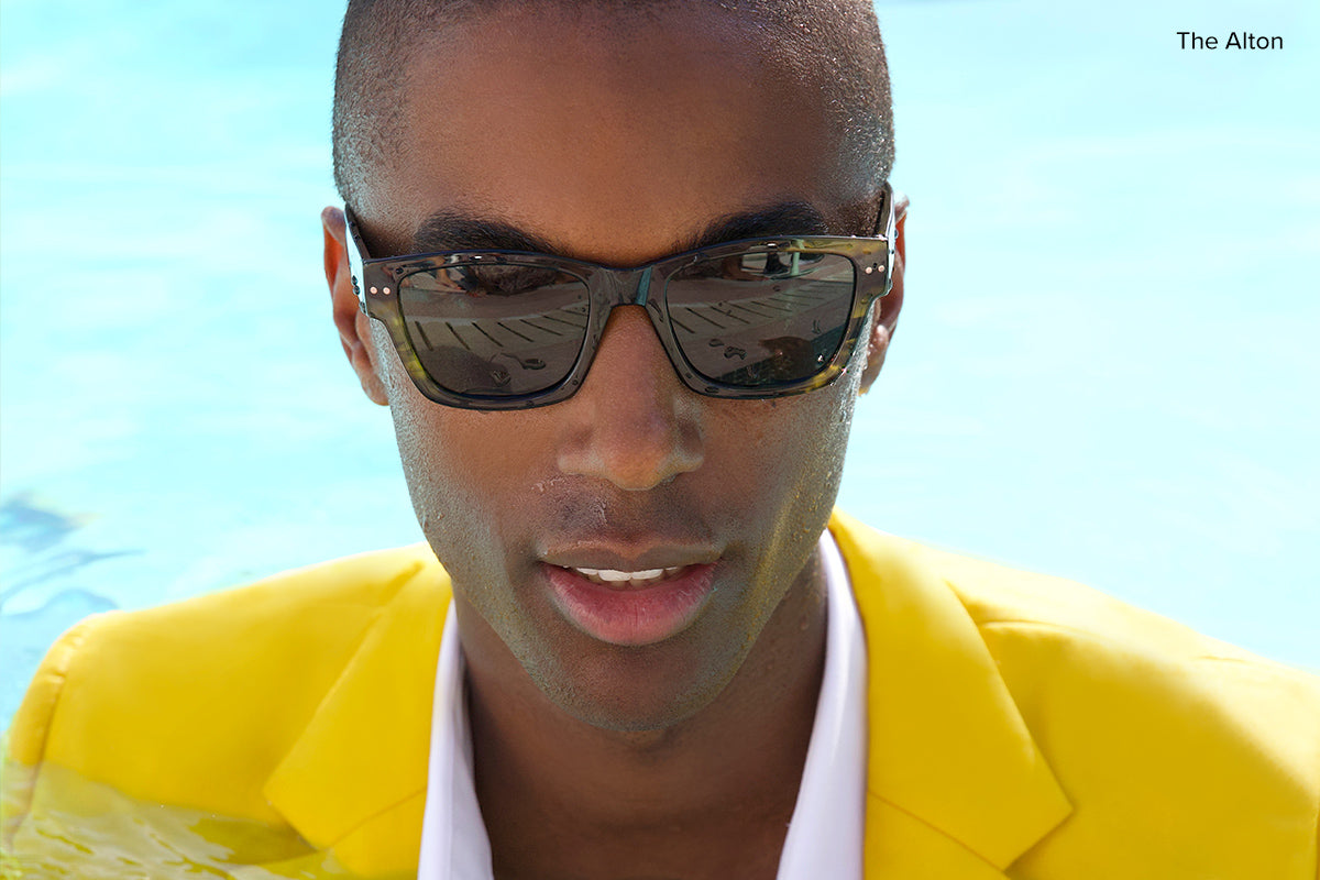 man wearing 90s style square sunglasses