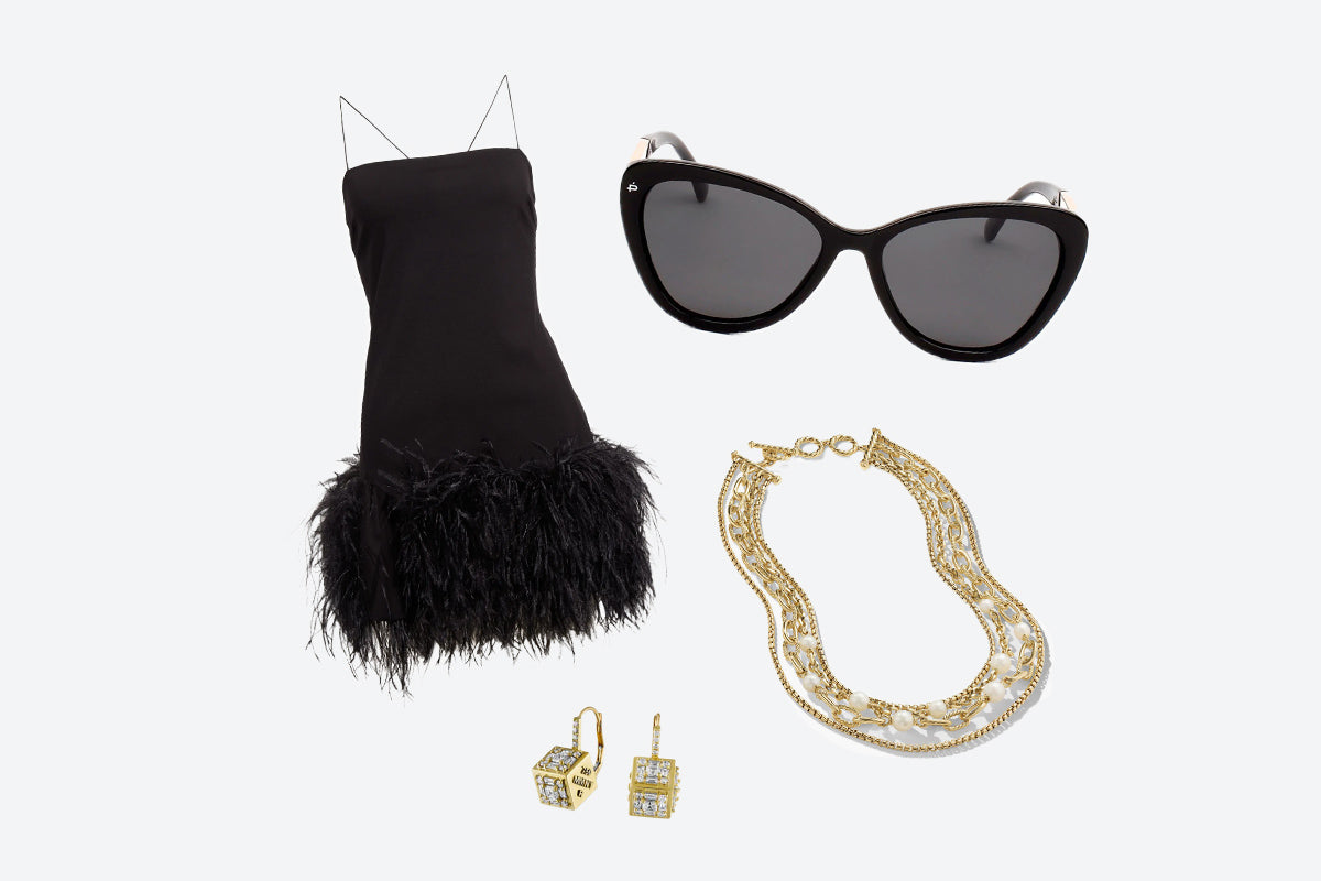 style black dress with jewelry and glasses