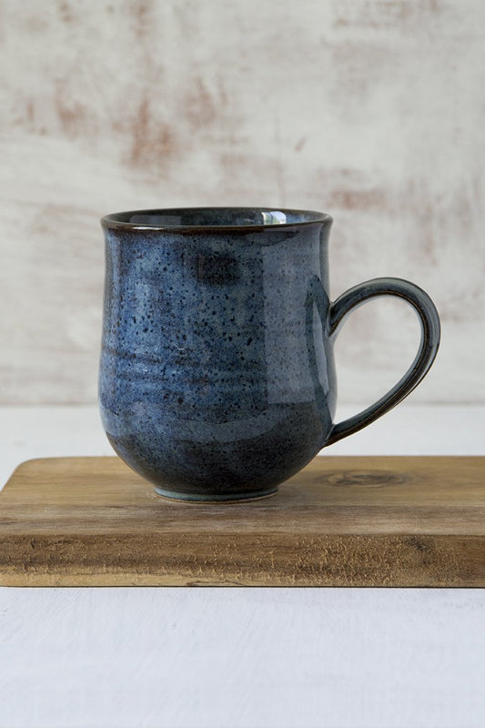 https://cdn.shopify.com/s/files/1/0017/8048/2163/products/blue-pottery-mug-10-fl-oz-158322.jpg?v=1593194917&width=533