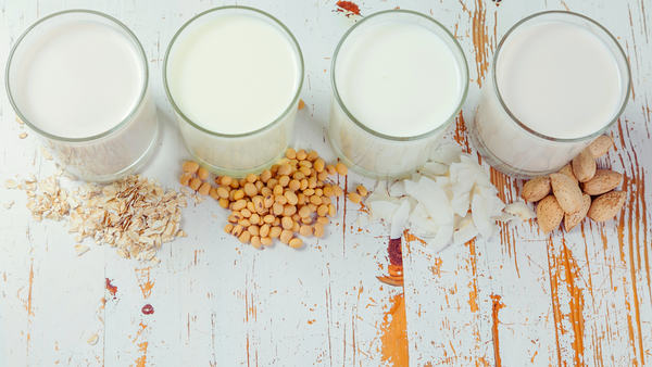 4 jars of non-dairy milk alternatives for coffee