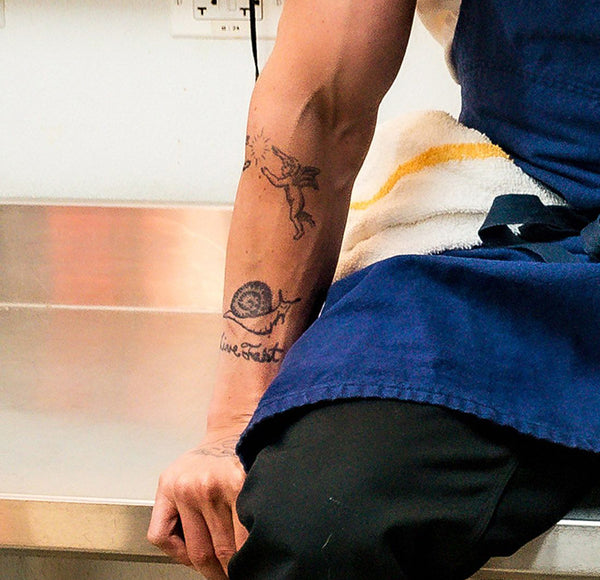carmy snail tattoo