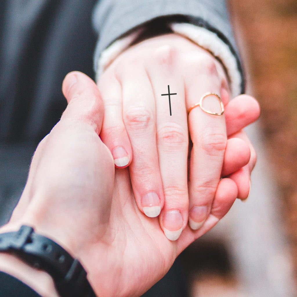 49 Elegant Cross Tattoos On Finger