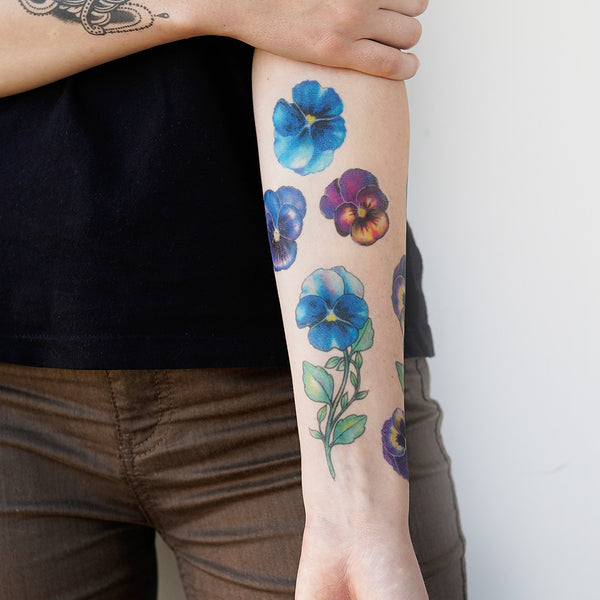 Capricorn and Pansies  Ancient Indigo  Tattoos by Amanda Appiarius