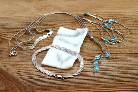 clean silver jewellery and bracelets with a cleaning cloth