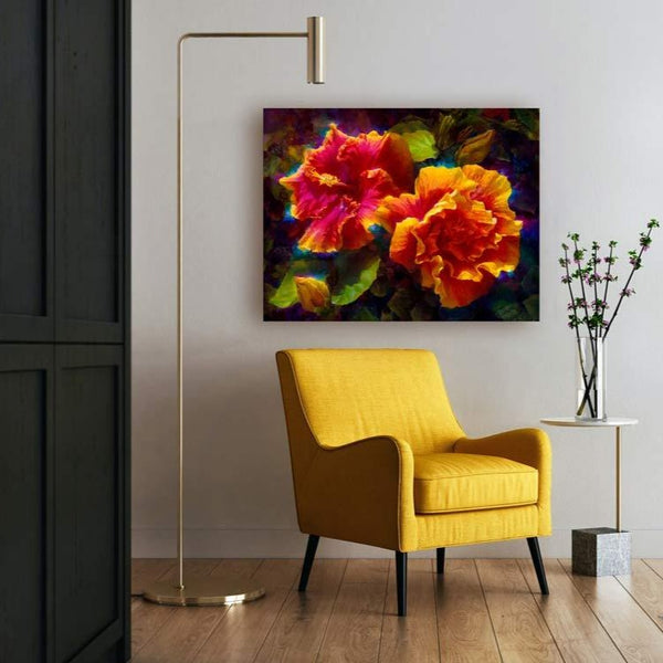 Wall art canvas of bright orange Hawaiian hibiscus flowers in living room with yellow accent chair and contemporary interior decor