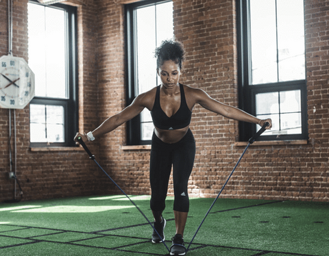 Woman with Resistance Bands