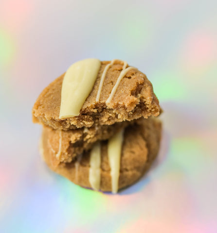 This stack of peanut butter, cream drizzled keto-friendly cookies were created by Logan, Utah's Num Gourmet Desserts. peanut butter keto cookies, keto desserts logan utah, logan utah dessert, num gourmet dessert, diabetic friendly treats, low carb high protein treat #NumGourmetDessrts #LoganUtah #LoganUtahDessert #KetoDessert #KetoBreakfast #KetoSweets #DiabeticFriendlyDesserts #KetoDiet #GuiltFreeDessert #HighProteinDessert