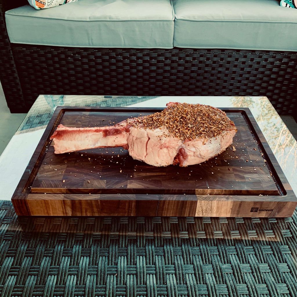 Premium Photo  Raw meat selection on wooden cutting board