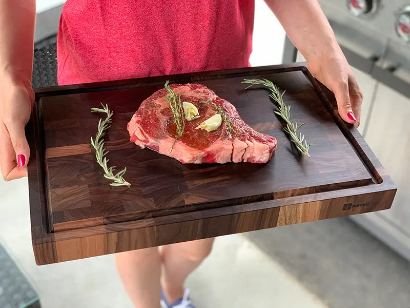 End grain cutting board with steak