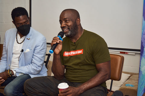Malik Yoba speaks to the crowd during the panel discussion