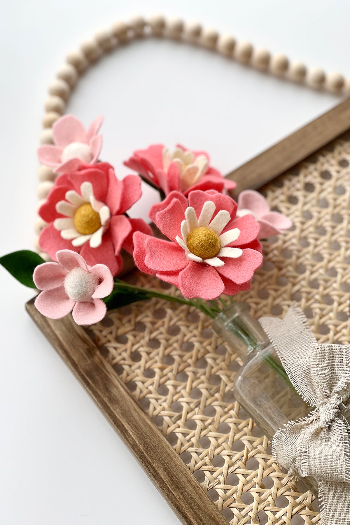 pink felt glady blossoms and 5 petal flower for the felt flower bouquet wall art diy by lorrie everitt of make and merry co on the felt stores blog