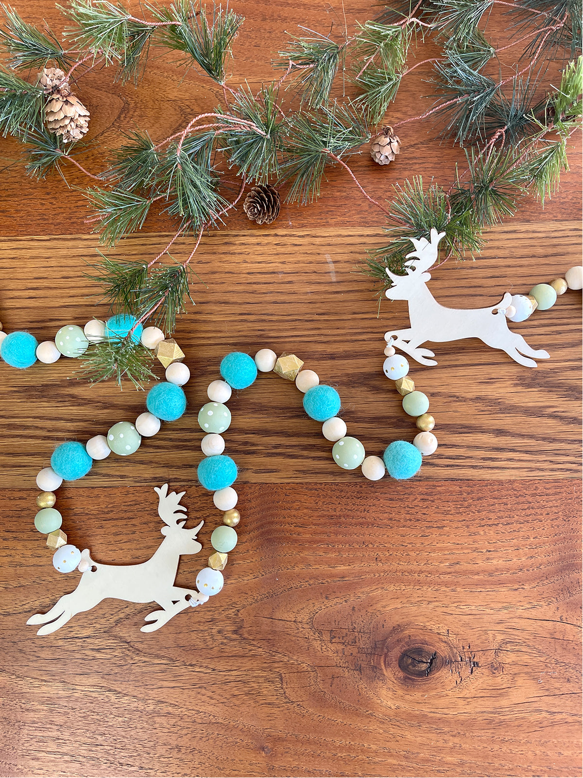  Five DIY holiday project ideas using wool felt balls by Make & Merry Co - Garland