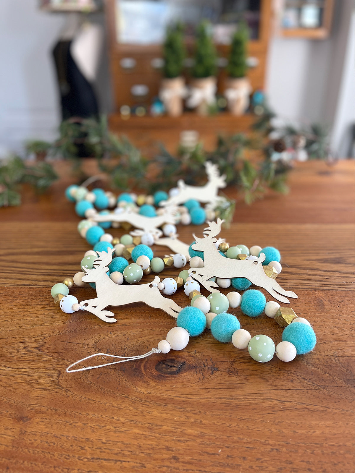  Five DIY holiday project ideas using wool felt balls by Make & Merry Co - Garland