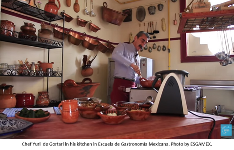 Chef Yuri de Gortari in his kitchen in Escuela de Gastronomia Mexicana, preparing chiles en nogada