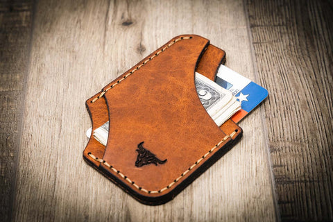 A leather card holder with card sleeves made from environmentally certified leather