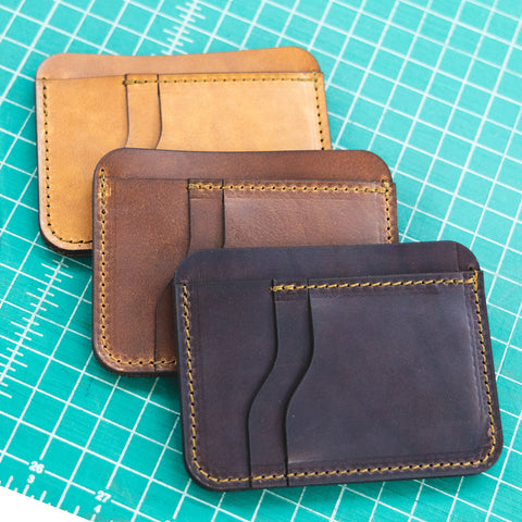 A minimalist wallet with business card holder and wallet slot