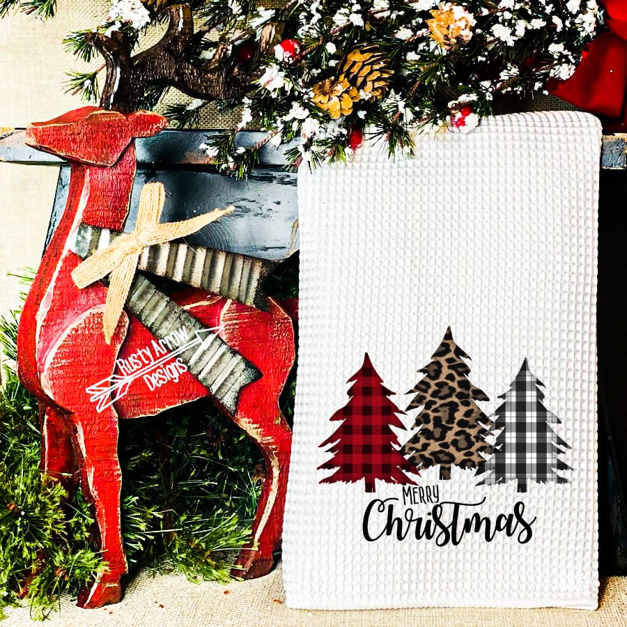 https://cdn.shopify.com/s/files/1/0018/4323/2828/products/merry-christmas-trees-waffle-weave-tea-towel-holiday-holidays-new-arrival-rusty-arrow-designs-wholesale-tree-eve-503.jpg