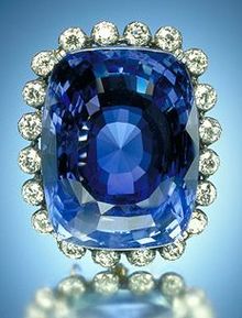 Logan Sapphire with diamonds surrounding