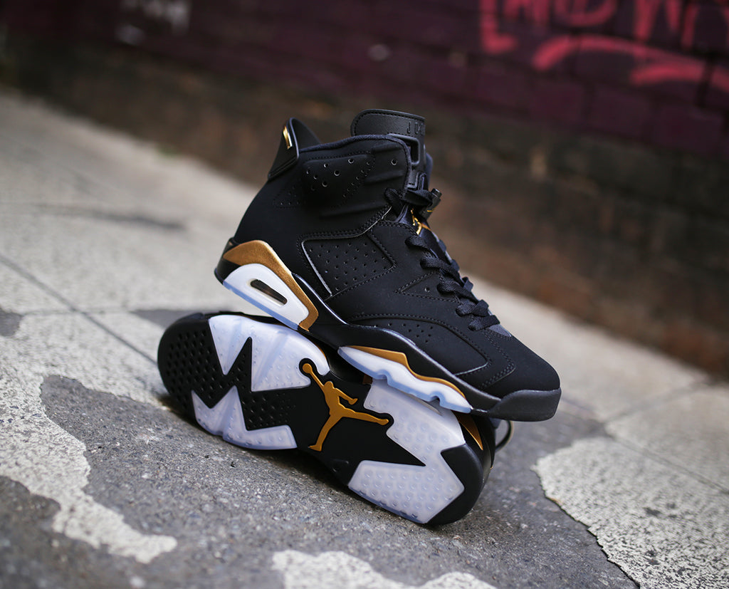 black & gold jordan 6