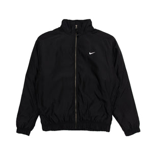 black nike windbreaker with white stripes