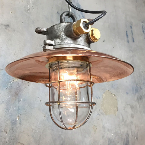 Rustic vintage style reclaimed copper ceiling lighting for a vaulted ceiling.