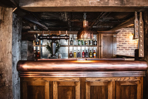 Copper accents home bar